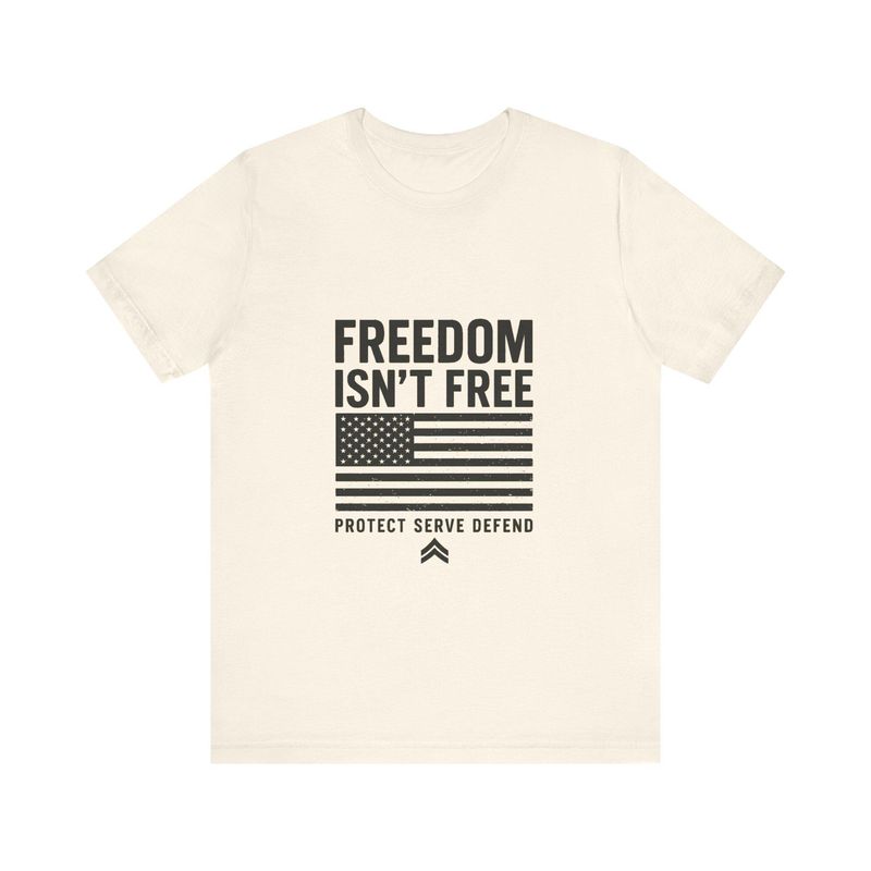 Freedom Isn't Free flag graphic tee by BySable, printed with an American flag and the words Protect, Serve, Defend.