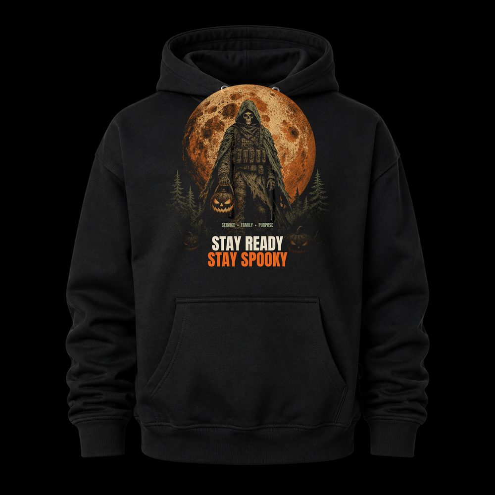 Stay Ready, Stay Spooky hoodie by BySable: a black pullover hoodie printed with a hooded figure carrying a jack-o-lantern in front of a full orange moon.